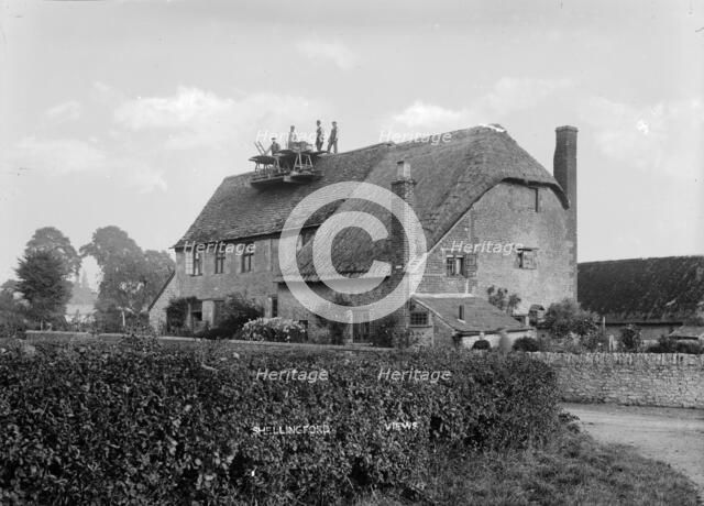 Workmen repairing a chimney of a cottage at Shellingford, Oxfordshire, c1860-c1922. Artist: Henry Taunt