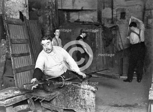 Worker at Whitefriars Glassworks, City of London, (early 20th century?).  Creator: Unknown.