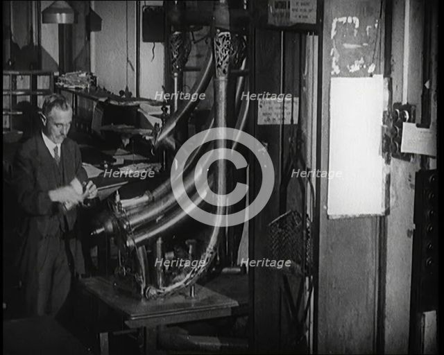 Worker in a Newspaper Office, 1921. Creator: British Pathe Ltd.