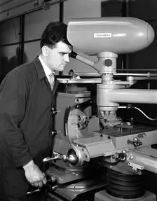 Worker using a cutting machine, Egdar Allen Steel Foundry, Sheffield, South Yorkshire, 1964. Creator: Michael Walters