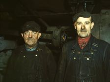 Workers at the roundhouse of the C & NW RR Proviso Yard, Chicago, Ill., 1942. Creator: Jack Delano