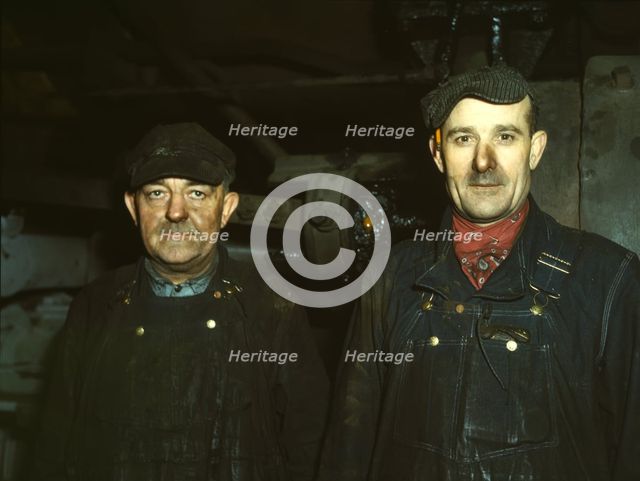 Workers at the roundhouse of the C & NW RR Proviso Yard, Chicago, Ill., 1942. Creator: Jack Delano.