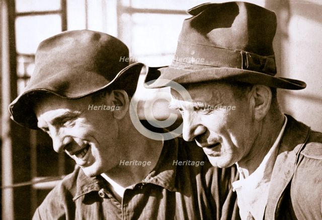 Workers contented at having found work, Germany, 1936.   Creator: Unknown.