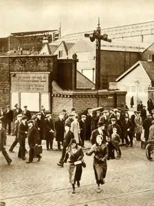 Workers leaving...after construction of Cunarder 534 was suspended, December 1931, (1935). Creator: Unknown
