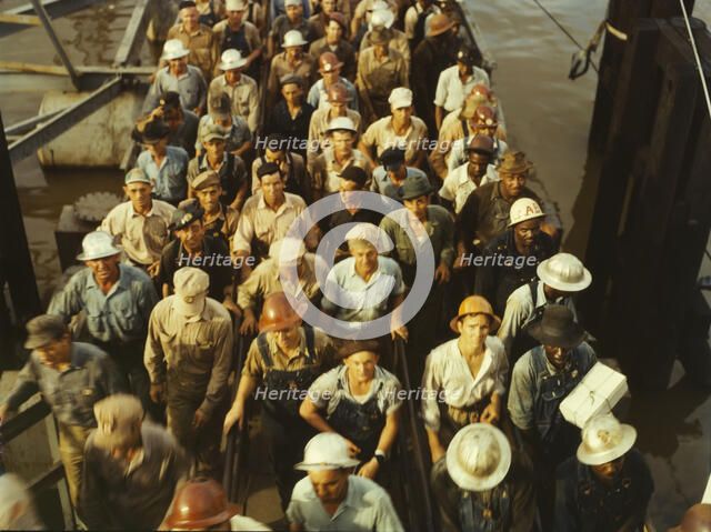 Workers leaving Pennsylvania shipyards, Beaumont, Texas, 1943. Creator: John Vachon.