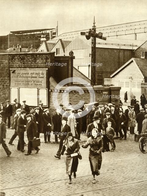 Workers leaving...after construction of 'Cunarder 534' was suspended, December 1931, (1935). Creator: Unknown.