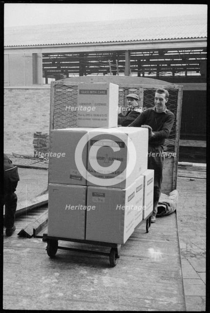Workers moving glassware at the Wear Flint Glass Works, Alfred Street, Millfield, Sunderland, 1961. Creator: Eileen Deste.