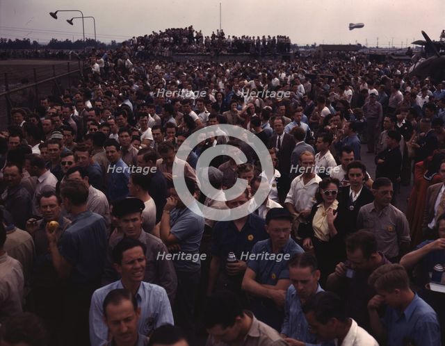 Workers on the Liberator Bombers, Consolidated Aircraft Corp., Fort Worth, Texas, 1942. Creator: Howard Hollem.