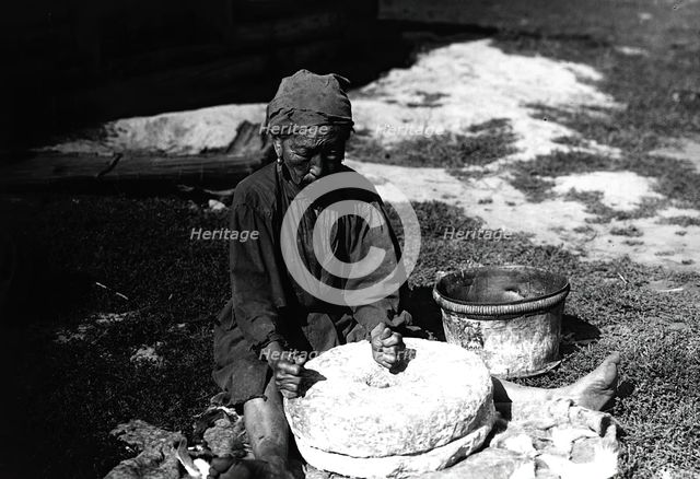 Working with a flour millstone, 1890. Creator: Unknown.