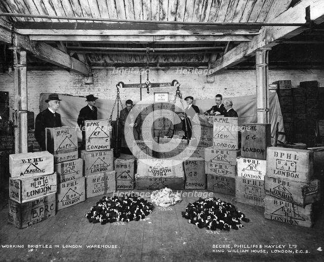 Working with bristles in a warehouse, London, 1938. Artist: Unknown