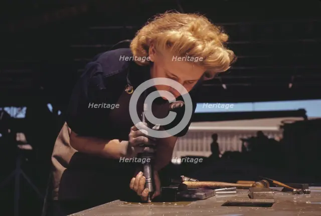 Working in the Assembly and Repair Dept. of the Naval Air Base, Corpus Christi, Texas, 1942. Creator: Howard Hollem.