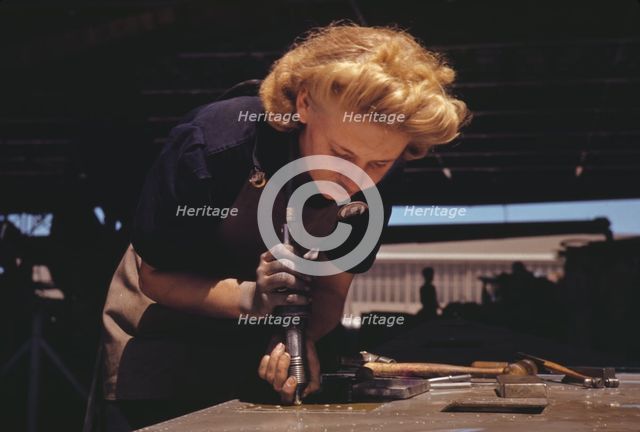 Working in the Assembly and Repair Dept. of the Naval Air Base, Corpus Christi, Texas, 1942. Creator: Howard Hollem.