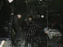 Working on the cab of a locomotive brought in for repair at the C & NW RR, Chicago, Ill., 1942. Creator: Jack Delano