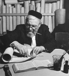 Working on a parchment scroll for a Torah, 1974. Creator: Unknown