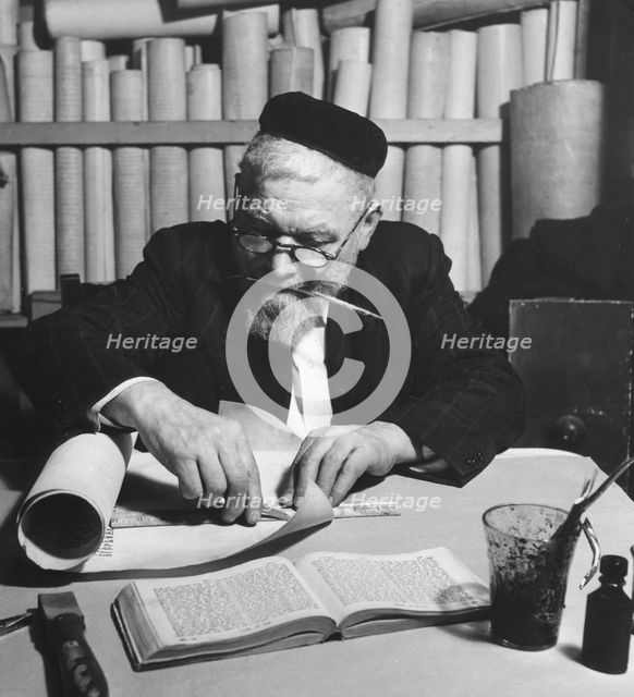 Working on a parchment scroll for a Torah, 1974. Creator: Unknown.