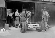 Working on Raymond Mays Vauxhall-Villiers, c1930s. Artist: Bill Brunell