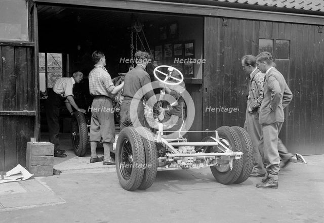 Working on Raymond Mays' Vauxhall-Villiers, c1930s. Artist: Bill Brunell.