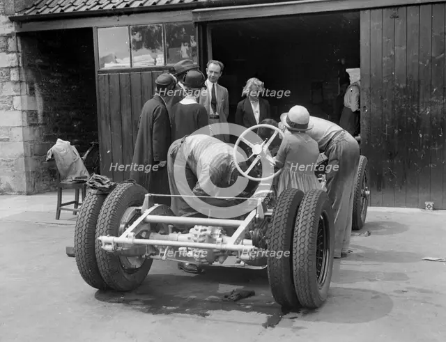 Working on Raymond Mays' Vauxhall-Villiers, c1930s. Artist: Bill Brunell.