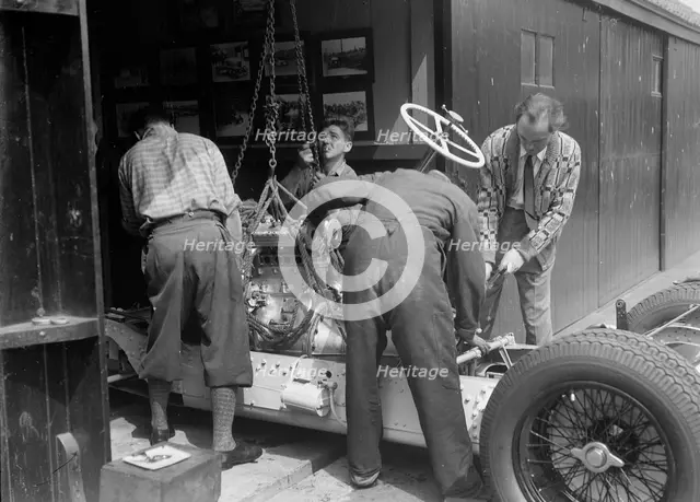 Working on Raymond Mays' Vauxhall-Villiers, c1930s. Artist: Bill Brunell.