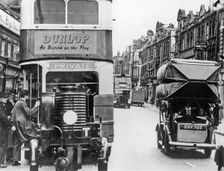 World War 2 street scene show gas converted vehicles. Creator: Unknown