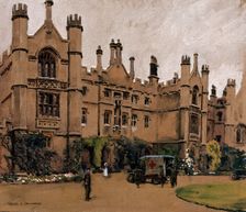 World War I: a neo-Gothic building used as a hospital, with an ambulance.., c1910s. Creator: Walter Ernest Spradbery