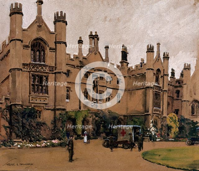 World War I: a neo-Gothic building used as a hospital, with an ambulance.., c1910s. Creator: Walter Ernest Spradbery.