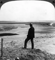 Watching a sand whirlwind from the top of Hawara pyramid, Egypt 1905.Artist: Underwood & Underwood