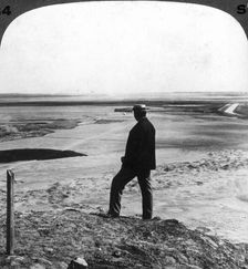 Watching a sand whirlwind from the top of Hawara pyramid, Egypt 1905.Artist: Underwood & Underwood