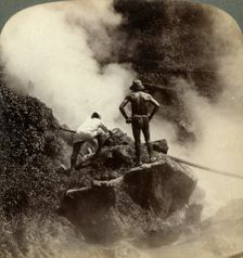 Watching an eruption of steam and boiling mud halfway up the volcano of Aso-san, Japan, 1904. Artist: Underwood & Underwood