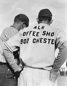 Watching ball game, Shafter migrant camp, California, 1938. Creator: Dorothea Lange