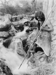 Watching for salmon-Hupa, c1923. Creator: Edward Sheriff Curtis