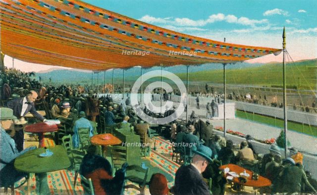 'Watching the Races in front of Club House, Agua Caliente Jockey Club', c1939. Artist: Unknown.