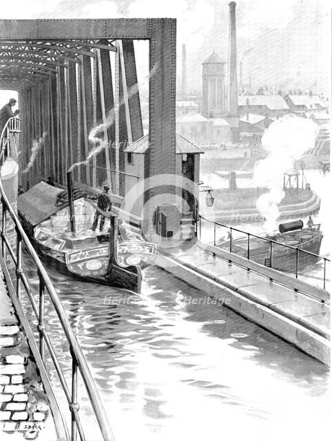 Water spanned by water: the Bridgewater Canal crossing the Manchester Ship Canal, 1909. Creator: Samuel Begg.