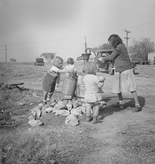 Water supply, Migratory camp for cotton pickers, San Joaquin Valley, California, 1936. Creator: Dorothea Lange