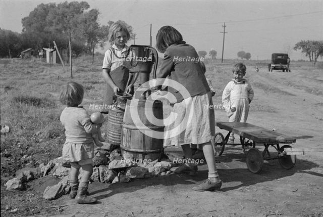 Water supply, American River camp, California, San Joaquin Valley, CA, 1936. Creator: Dorothea Lange.