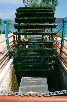 Water wheel, Karavomilos Lake, Kefalonia, Greece. Creator: Peter Thompson