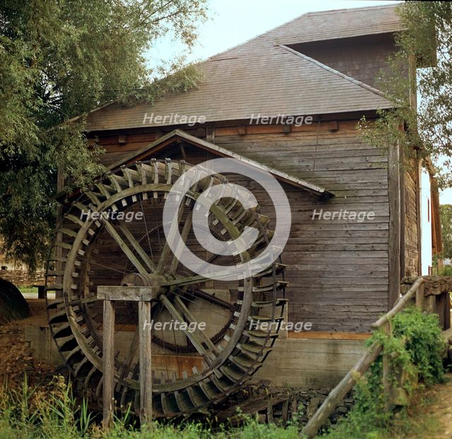 Waterwheel for a mill in Hungary. Artist: CM Dixon Artist: Unknown