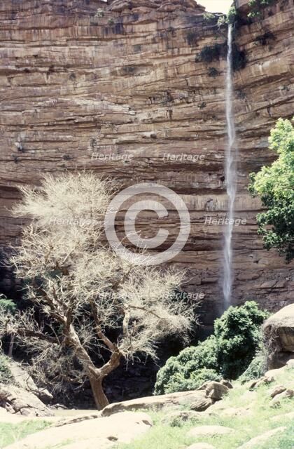 Waterfall before rain, Bandiagara Escarpment, Pays Dogon, Mali, 1990. Creator: Amanda Waite.