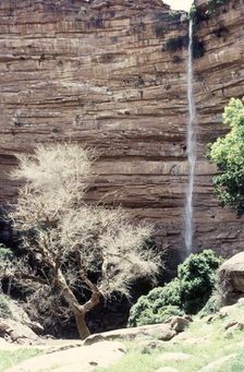 Waterfall before rain, Bandiagara Escarpment, Pays Dogon, Mali, 1990. Creator: Amanda Waite