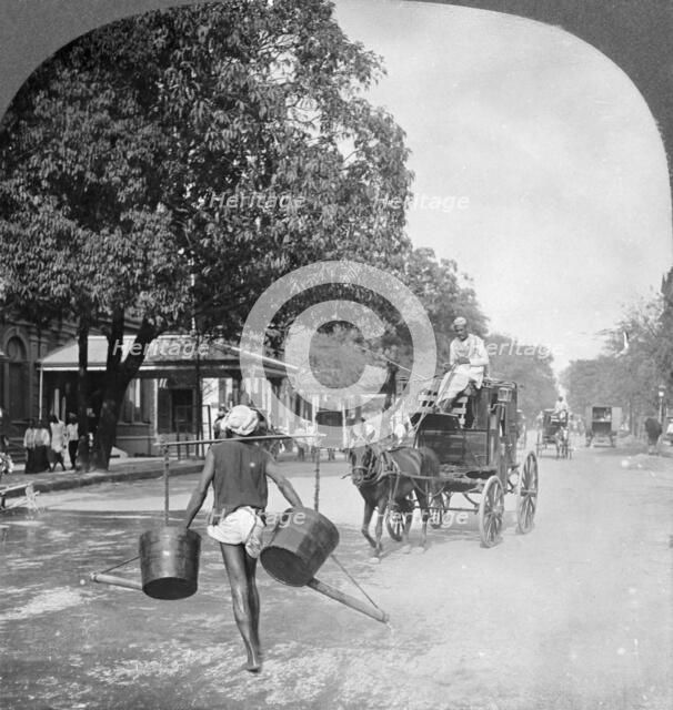 Watering the streets of Rangoon, Burma, 1908. Artist: Stereo Travel Co
