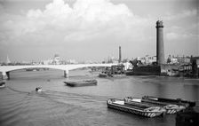 Waterloo Bridge, London, during its construction in 1937-42. Artist: SW Rawlings