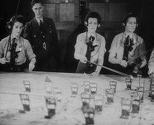 WAAF Plotters Working With Plotting Equipment, 1940. Creator: British Pathe Ltd