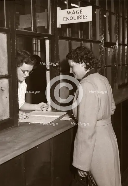 Wages office, Rowntree factory, York, Yorkshire, 1952. Artist: Unknown