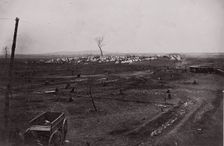 [Wagon in a landscape with army encampment in the distance]. Brady album, p. 125, 1861-65. Creator: Unknown