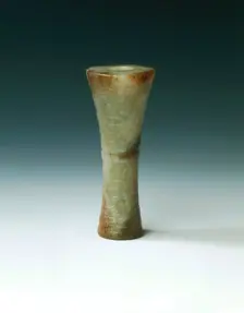 Waisted tubular jade bead with panchi decoration, Spring and Autumn period, China, 770 BC-475 BC. Creator: Unknown