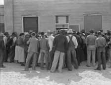 Waiting for relief checks, Calipatria, California, 1937. Creator: Dorothea Lange