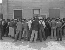 Waiting for relief checks, Calipatria, California, 1937. Creator: Dorothea Lange