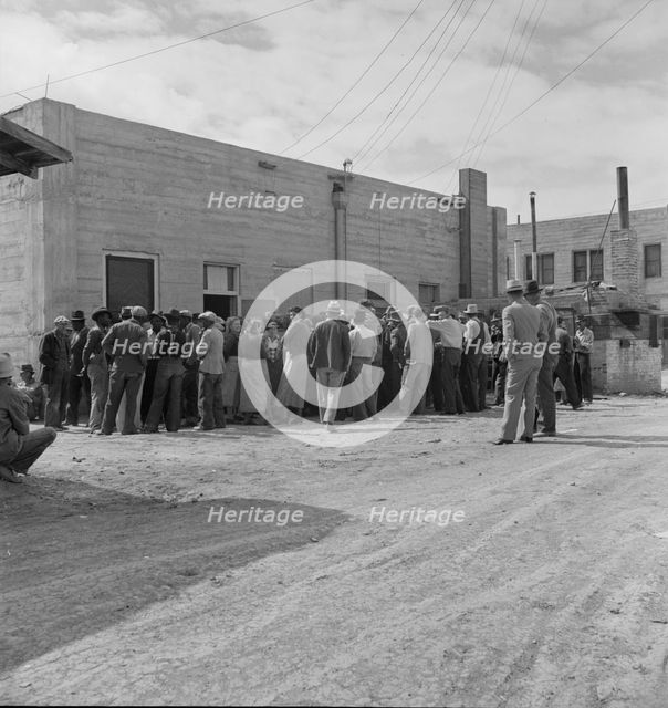 Waiting for the relief checks at Calipatria, California, 1937. Creator: Dorothea Lange.