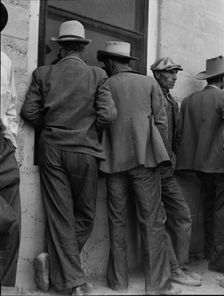 Waiting for the relief checks at Calipatria, California, 1937. Creator: Dorothea Lange