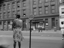 Waiting for the street car at 7th and Florida Avenue, N.W., Washington, D.C., 1942. Creator: Gordon Parks